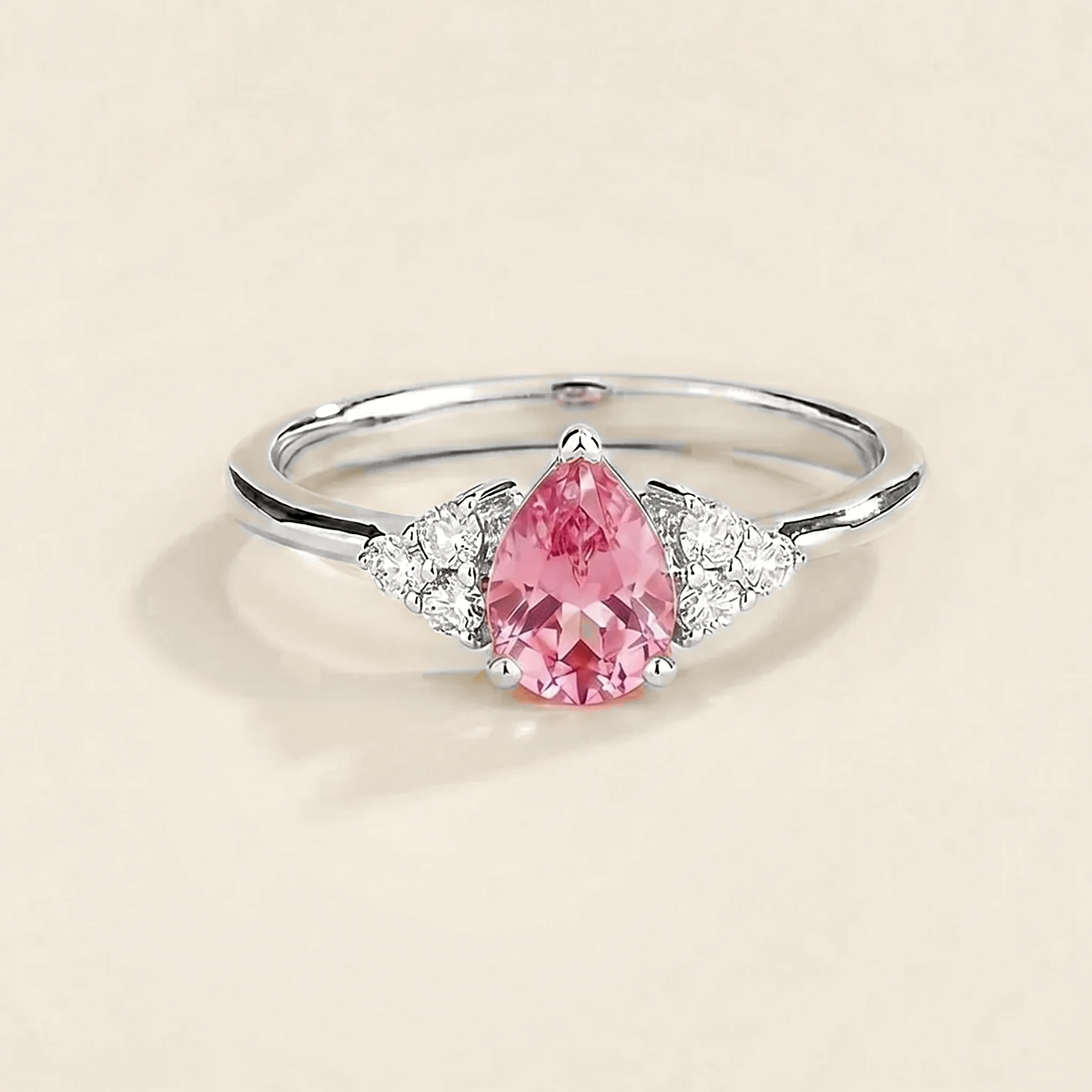 Pear-cut lab-grown pink sapphire and diamond ring in white gold – front view | Pisa by Juvetti