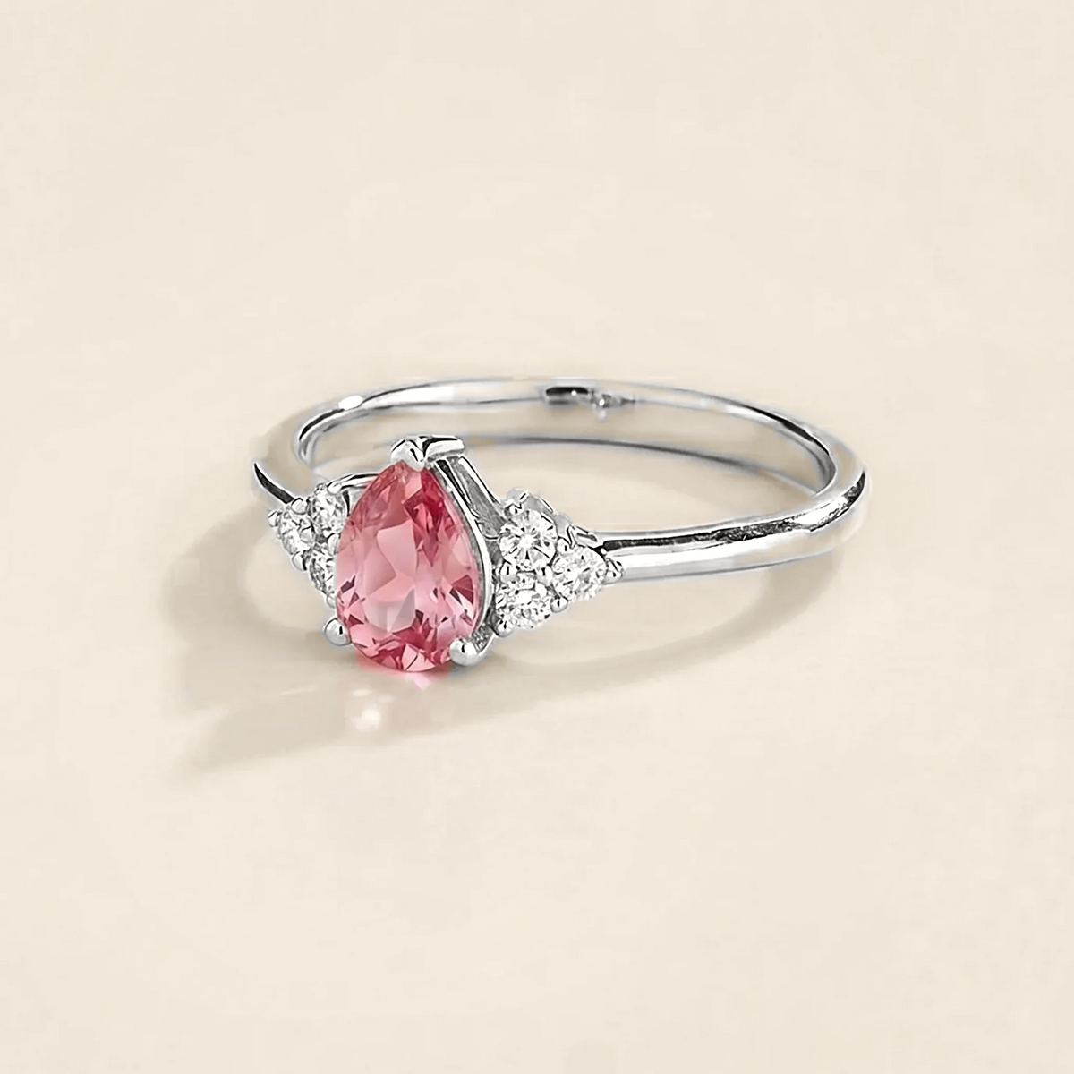 Pear-cut lab-grown pink sapphire and diamond ring in white gold – side view | Pisa by Juvetti