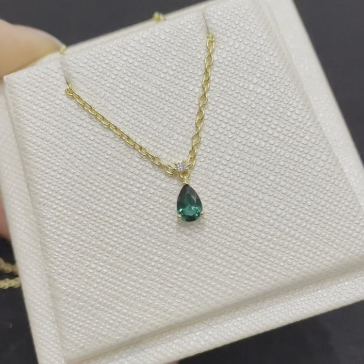 Review of Ori small pendant necklace in Emerald and Diamond set in Gold Bespoke London Jewellery Store