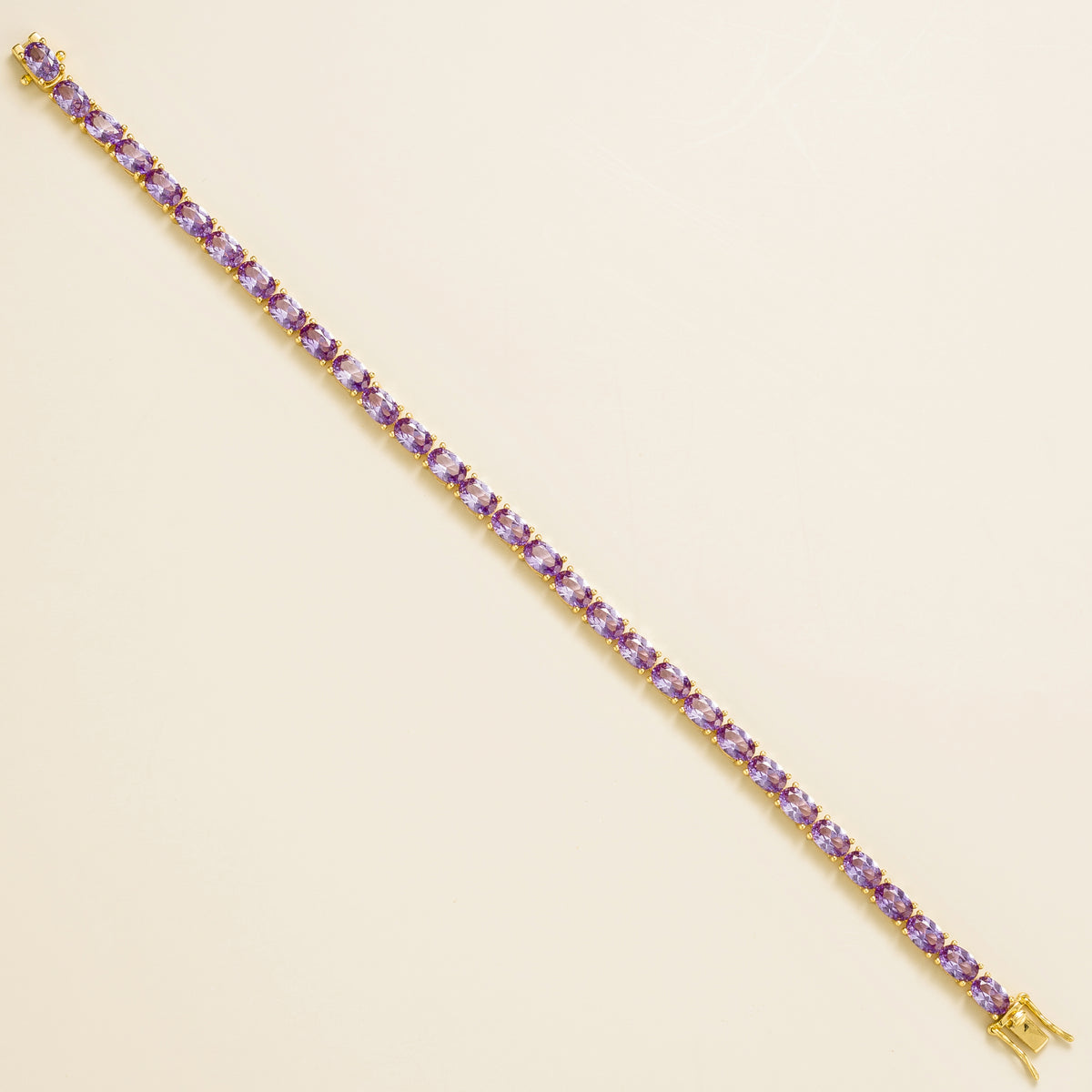 Salto Purple Sapphire Oval Tennis Bracelet in Gold – angle view