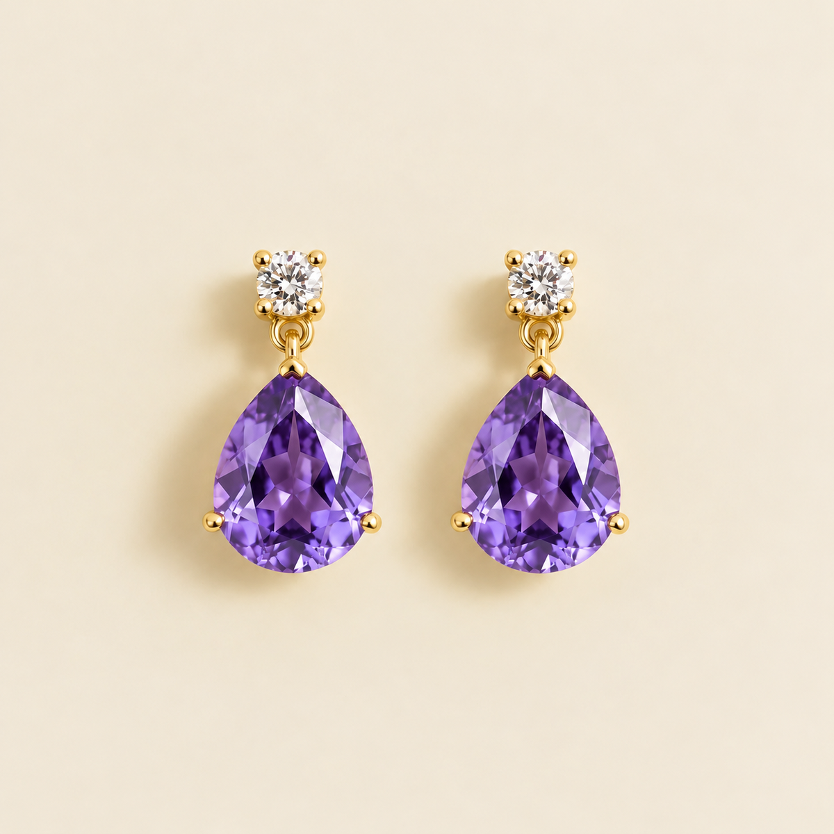 Medium lab-grown purple sapphire and diamond pear drop earrings in gold – front view | Pisa by Juvetti