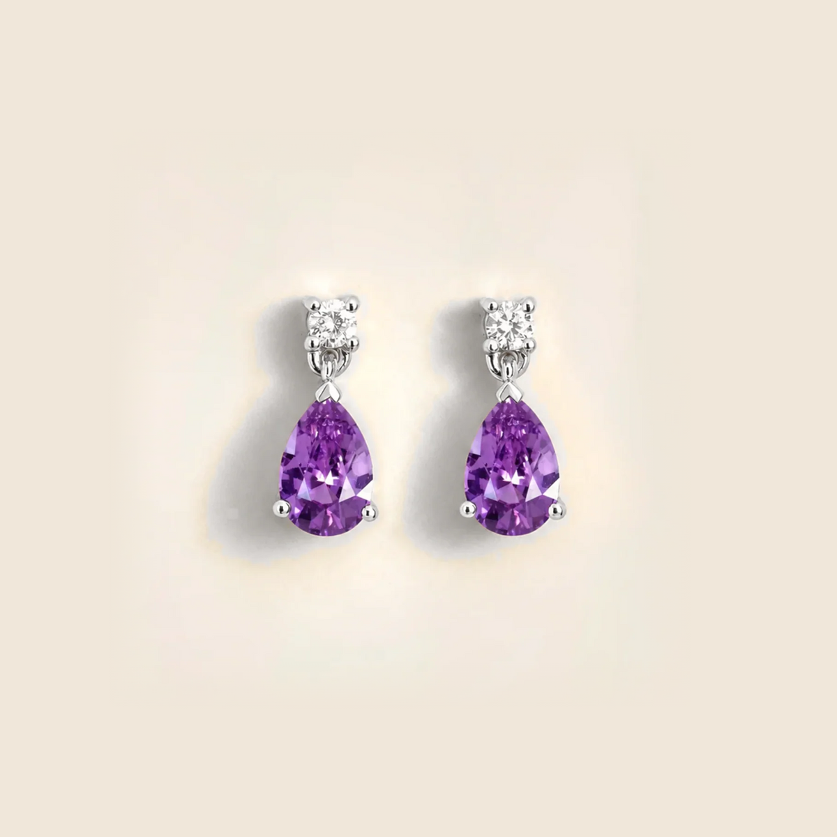 Lab-grown purple sapphire and diamond pear drop earrings in white gold – front view | Pisa by Juvetti