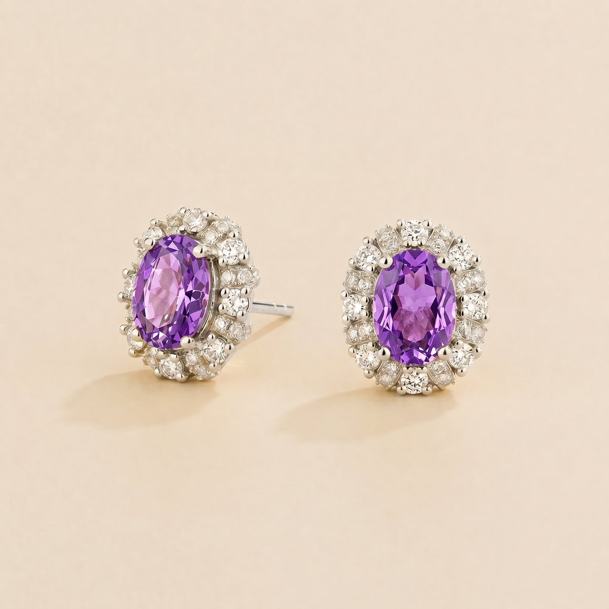 Viva oval purple sapphire and diamond halo stud earrings in white gold – angle view