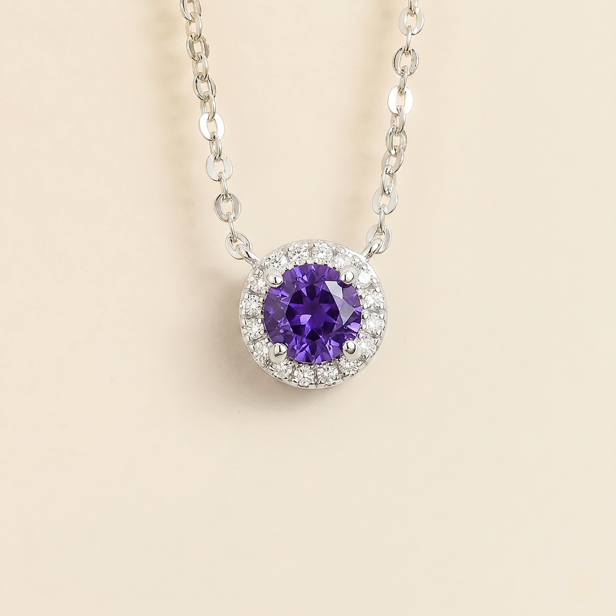 Front view of the Mars Purple Sapphire Round & Diamond Halo Necklace In White Gold, handcrafted by Juvetti London