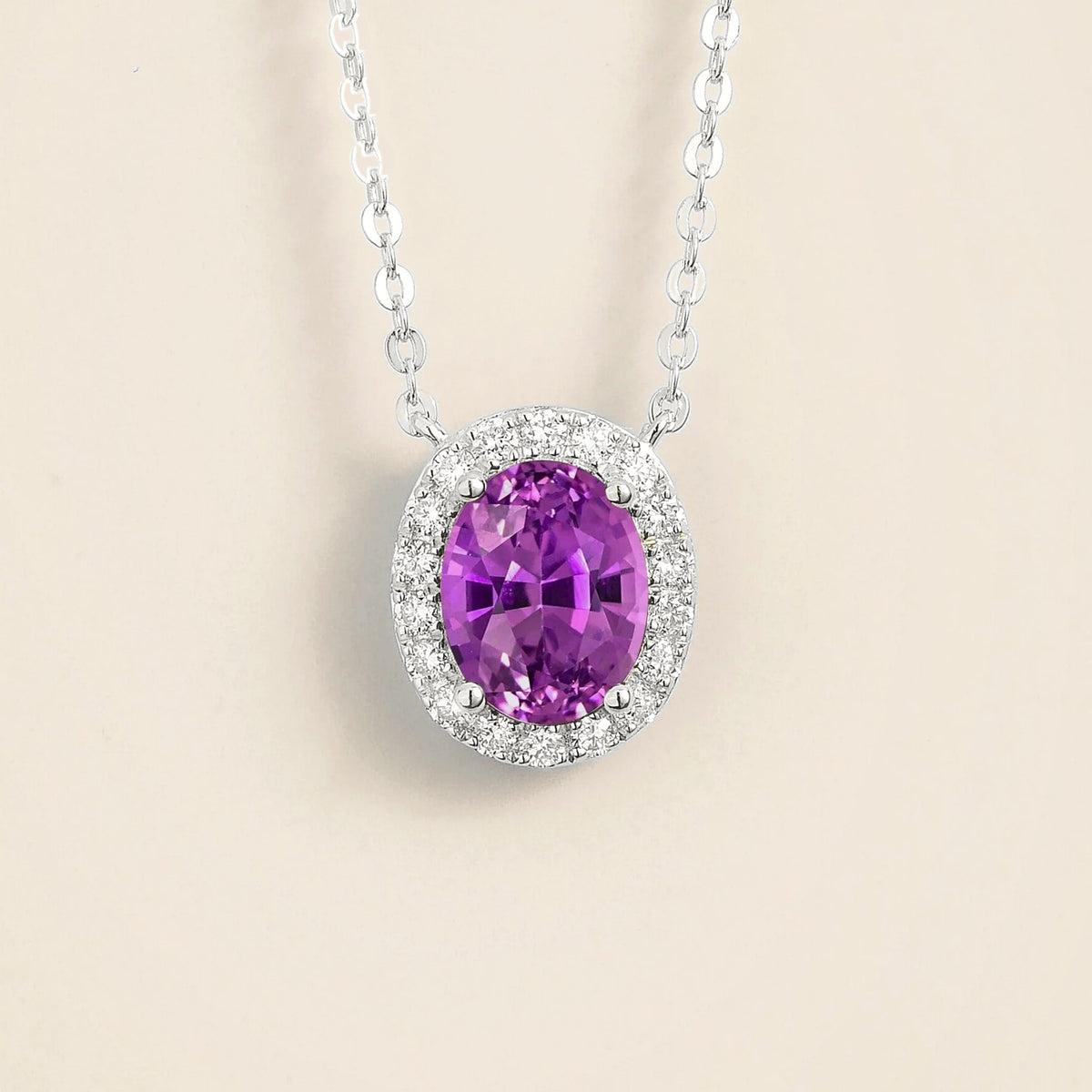 Lab-grown purple sapphire and diamond oval halo necklace in white gold – front view | Mina by Juvetti