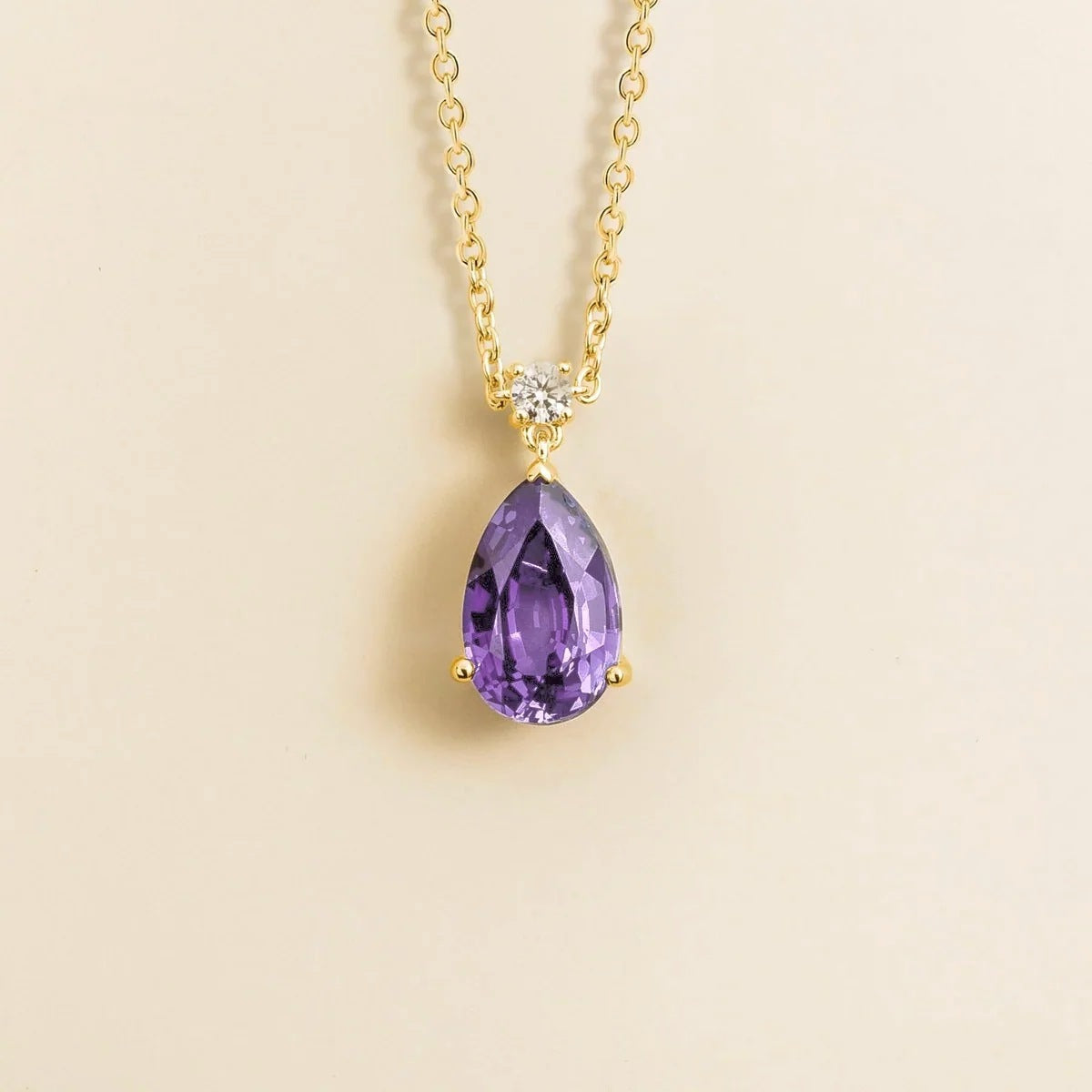 Lab-grown purple sapphire and diamond pear drop pendant necklace in gold, large – front view | Pisa by Juvetti