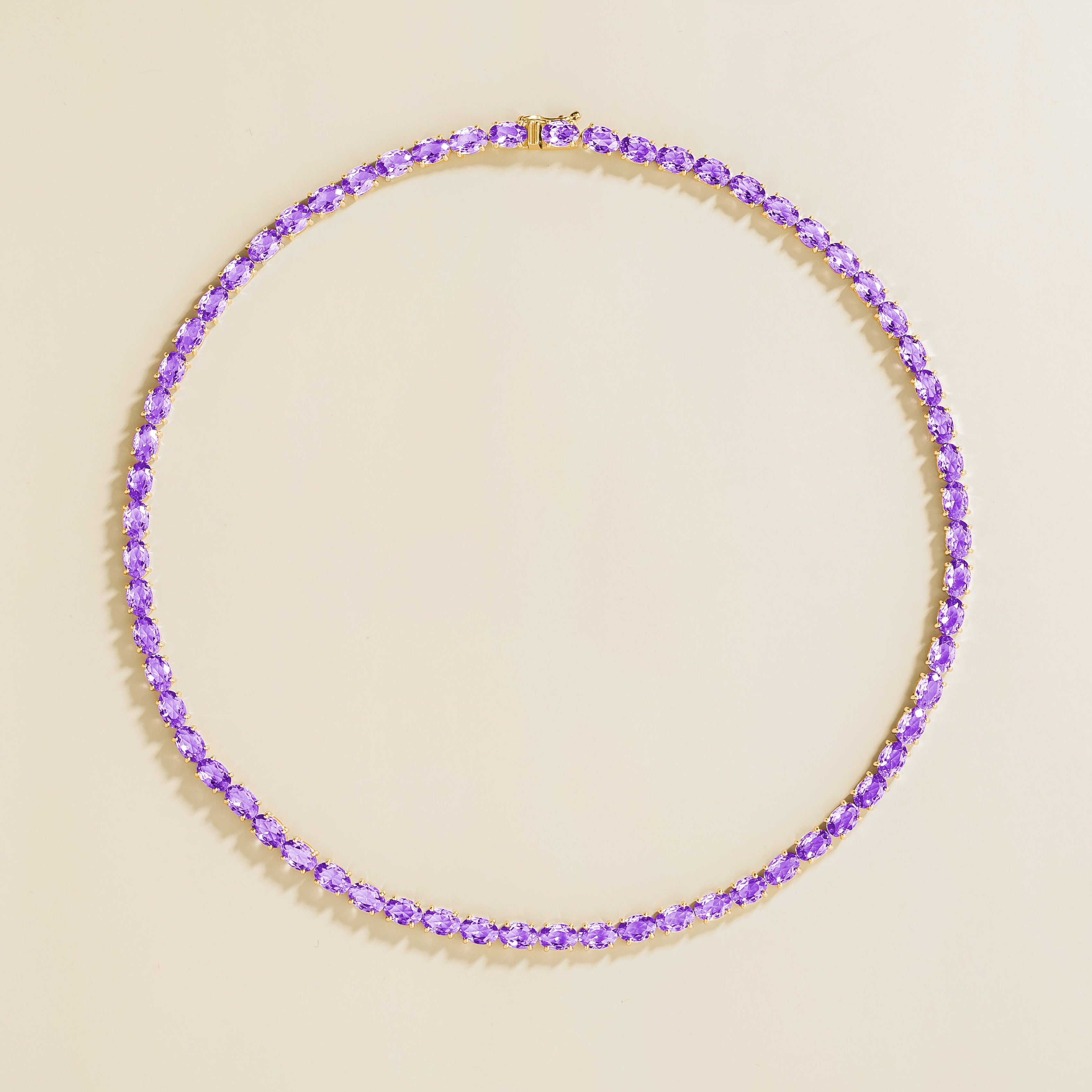 Salto Purple Sapphire Oval Tennis Necklace in Gold by Juvetti, bespoke jewellery London