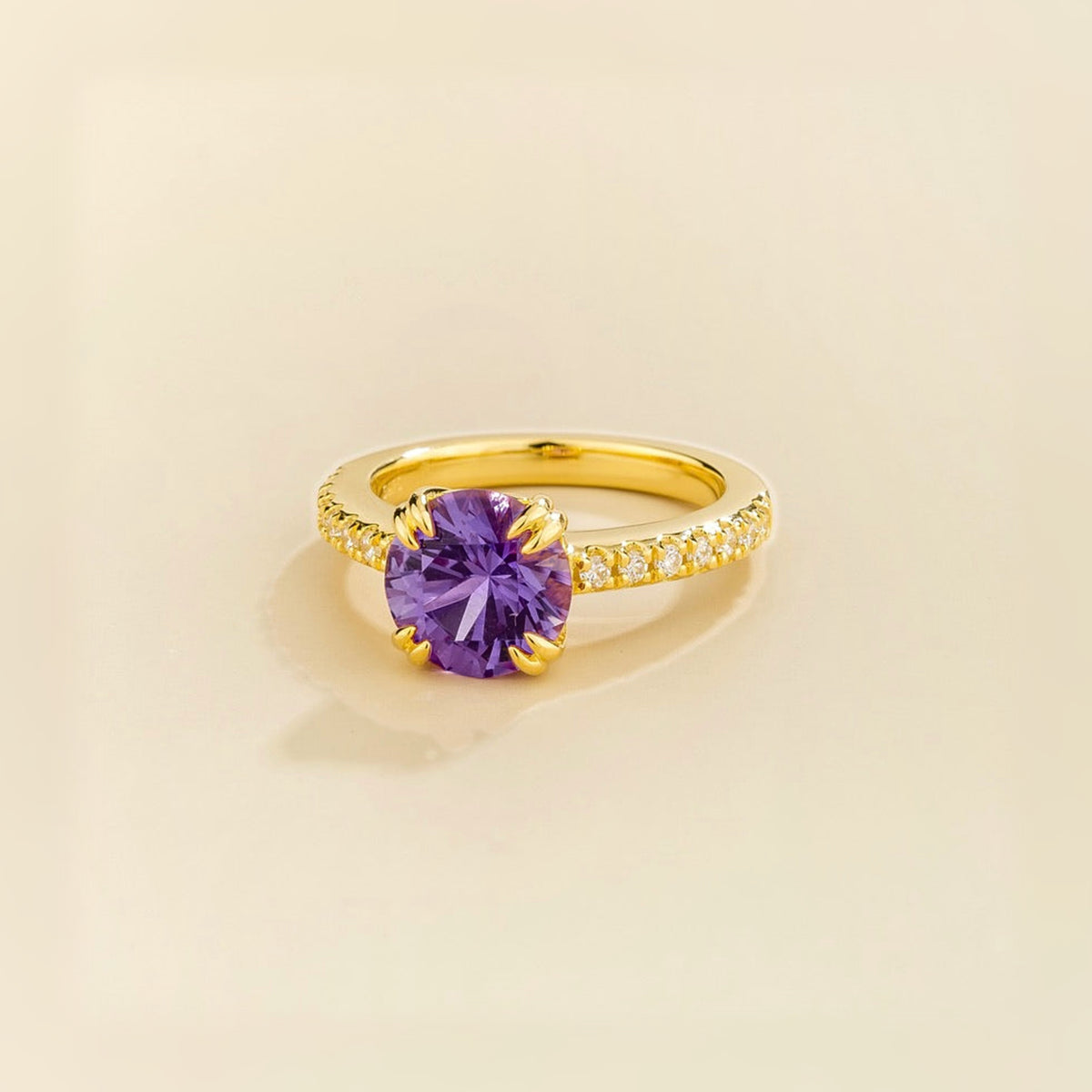 Como round lab-grown purple sapphire solitaire pavé ring in gold – angle | Juvetti London