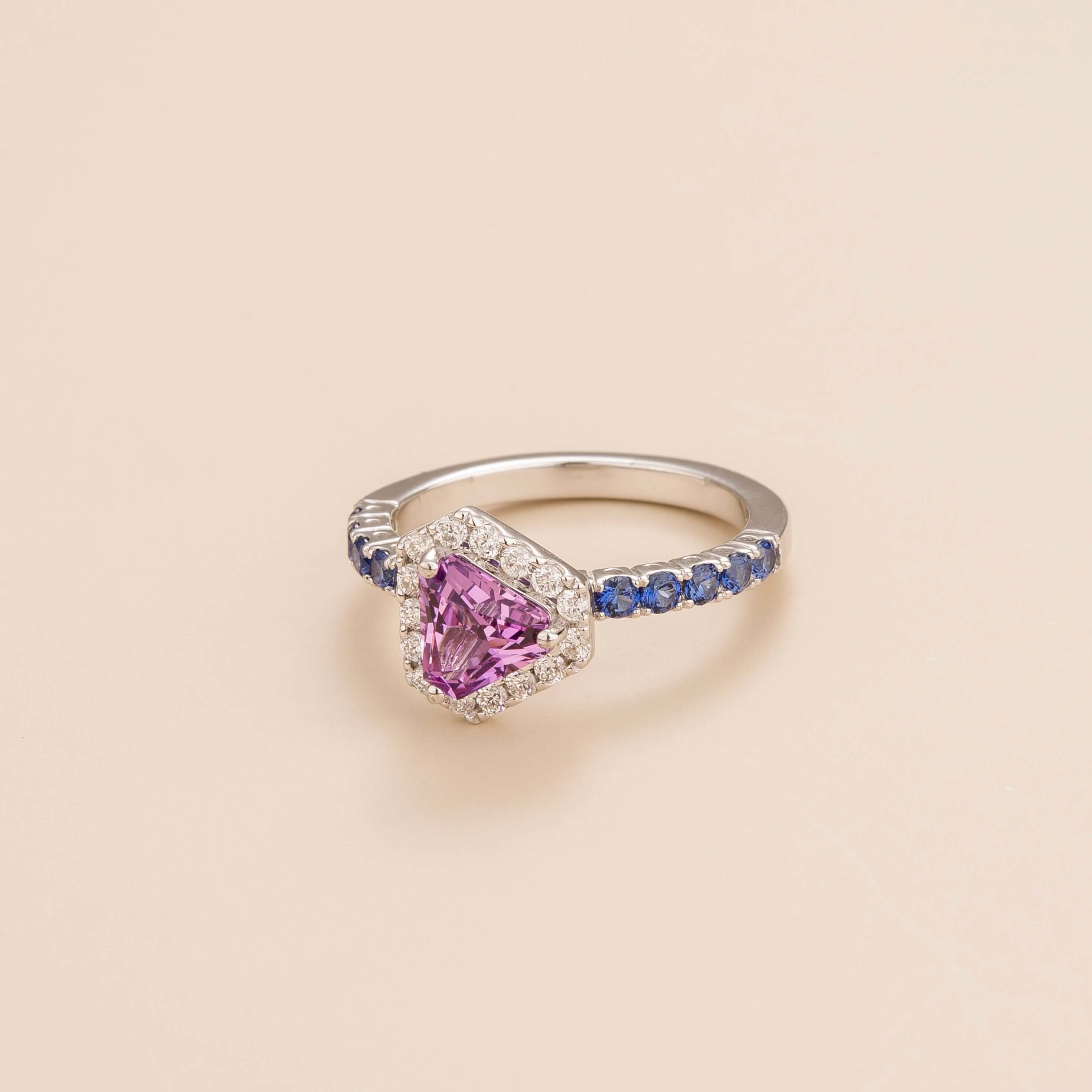 Side view of the Diana purple sapphire ring in white gold showing the triangle purple sapphire, Juvetti London