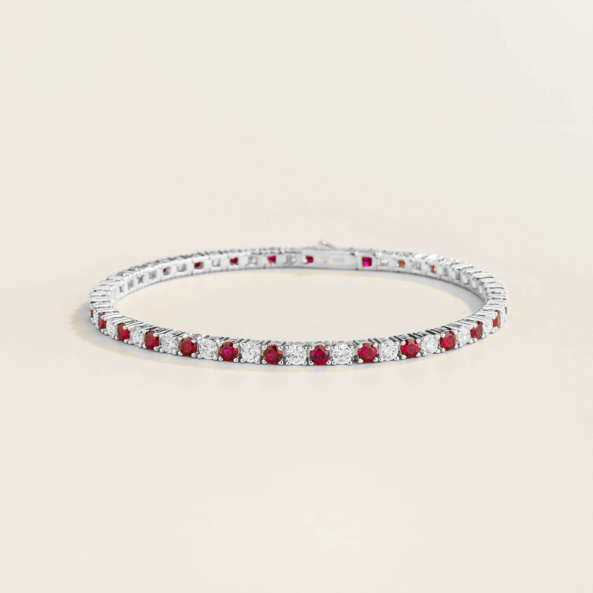 Round lab-grown ruby and diamond tennis bracelet in white gold | Juvetti London
