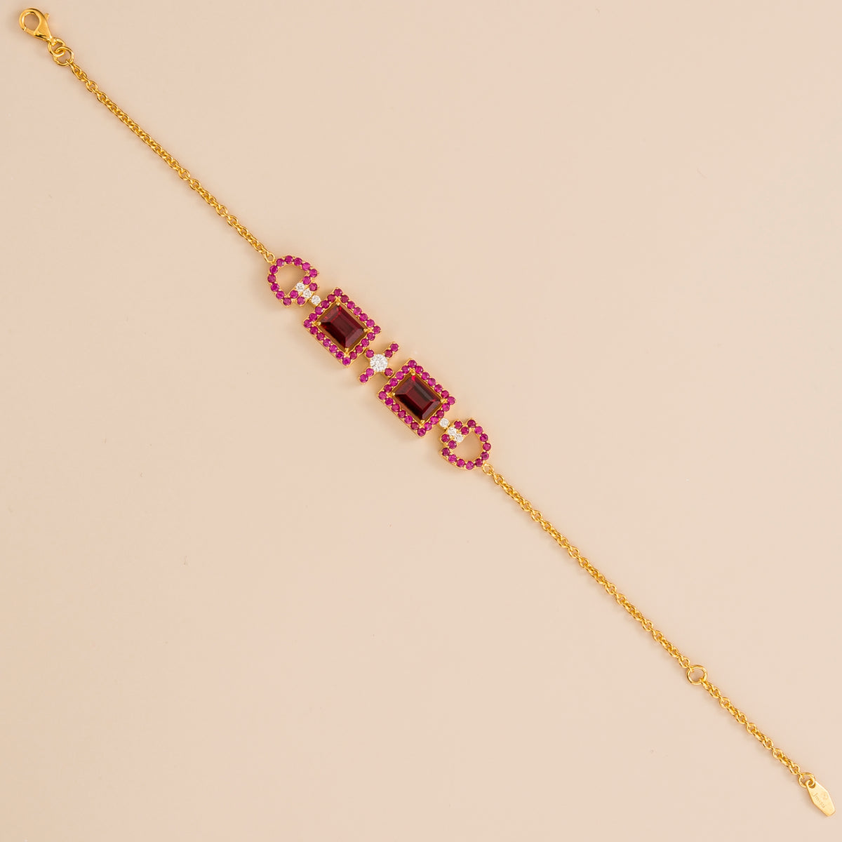 Ciceris ruby Art Deco halo bracelet in gold, two emerald-cut lab-grown rubies with diamonds, full length | Juvetti London