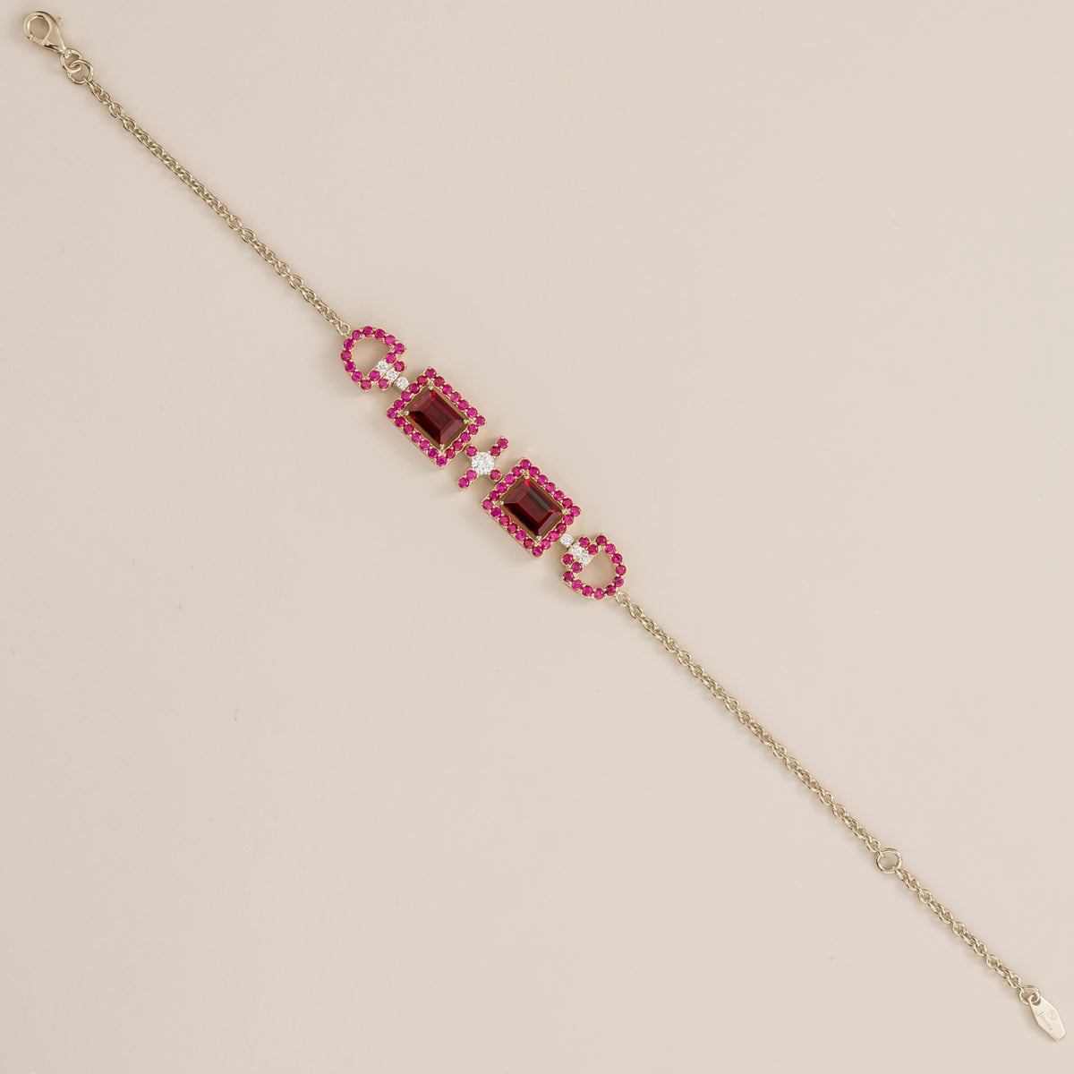 Ciceris ruby Art Deco halo bracelet in white gold, two emerald-cut lab-grown rubies with diamonds, full length | Juvetti London