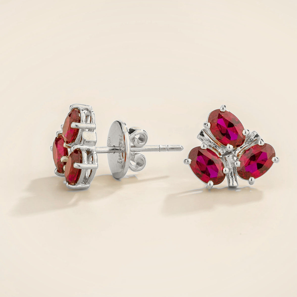 Ligna oval ruby cluster stud earrings in white gold – side view