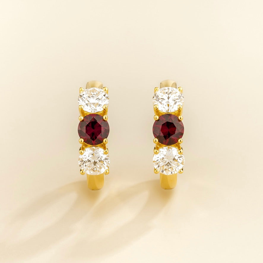 Tres Ruby Three-Stone Huggie Hoop Earrings – close-up