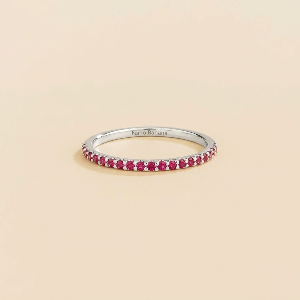 Juvetti white gold half eternity band set with round lab-grown ruby gemstones.