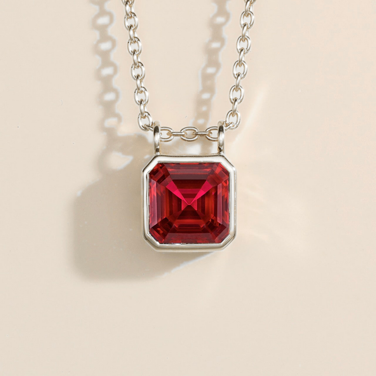 Calin Ruby Asscher-Cut Solitaire Pendant Necklace in White Gold by Juvetti London