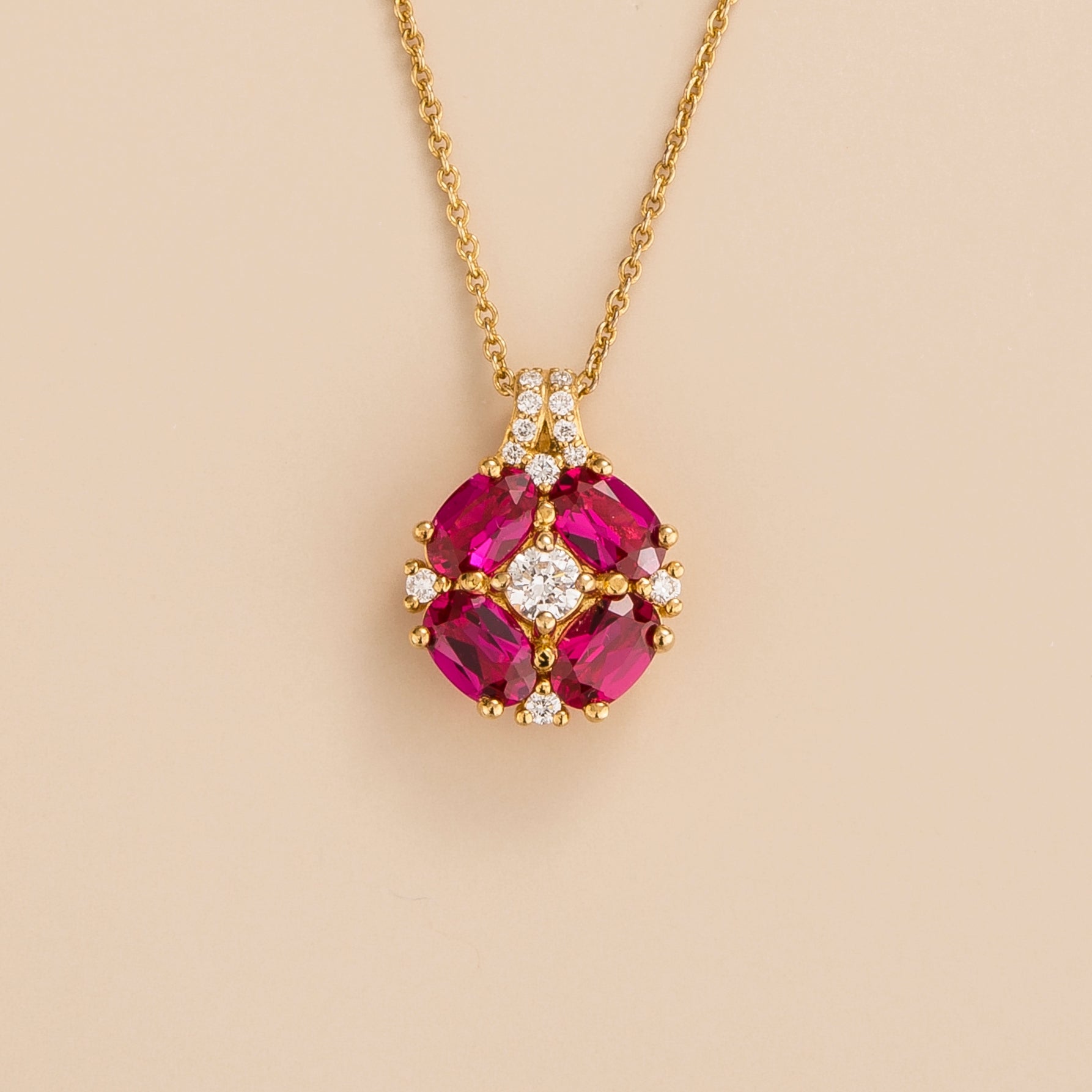 Pristi Oval Ruby & Diamond Cluster Pendant in Gold by Juvetti London