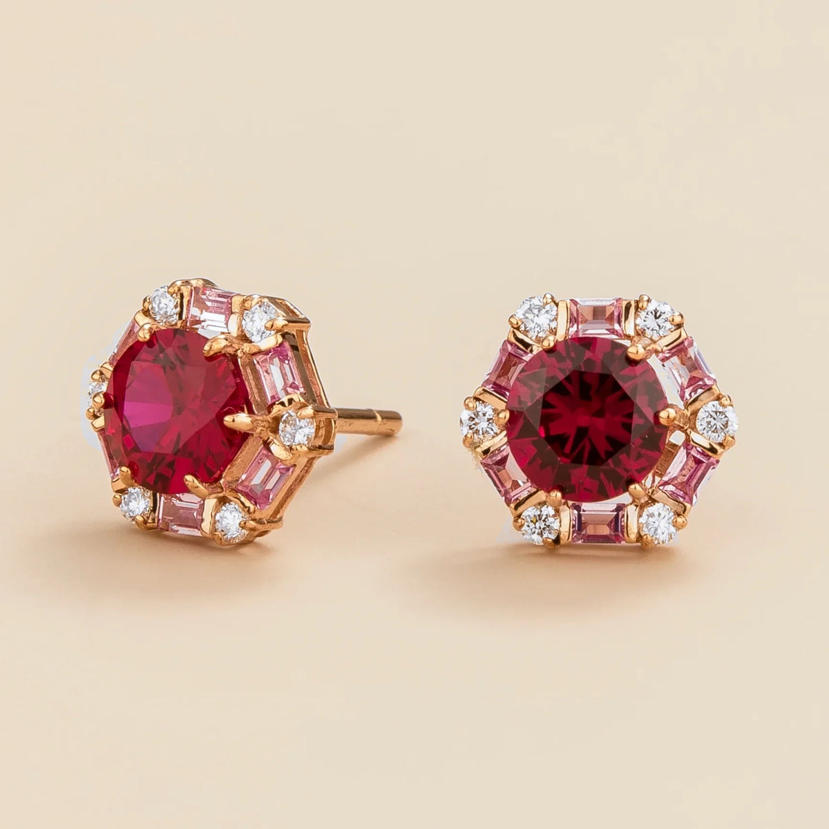 Melba hexagon earrings in 18K pink gold vermeil set with ruby, pink sapphire and diamond gemstones.