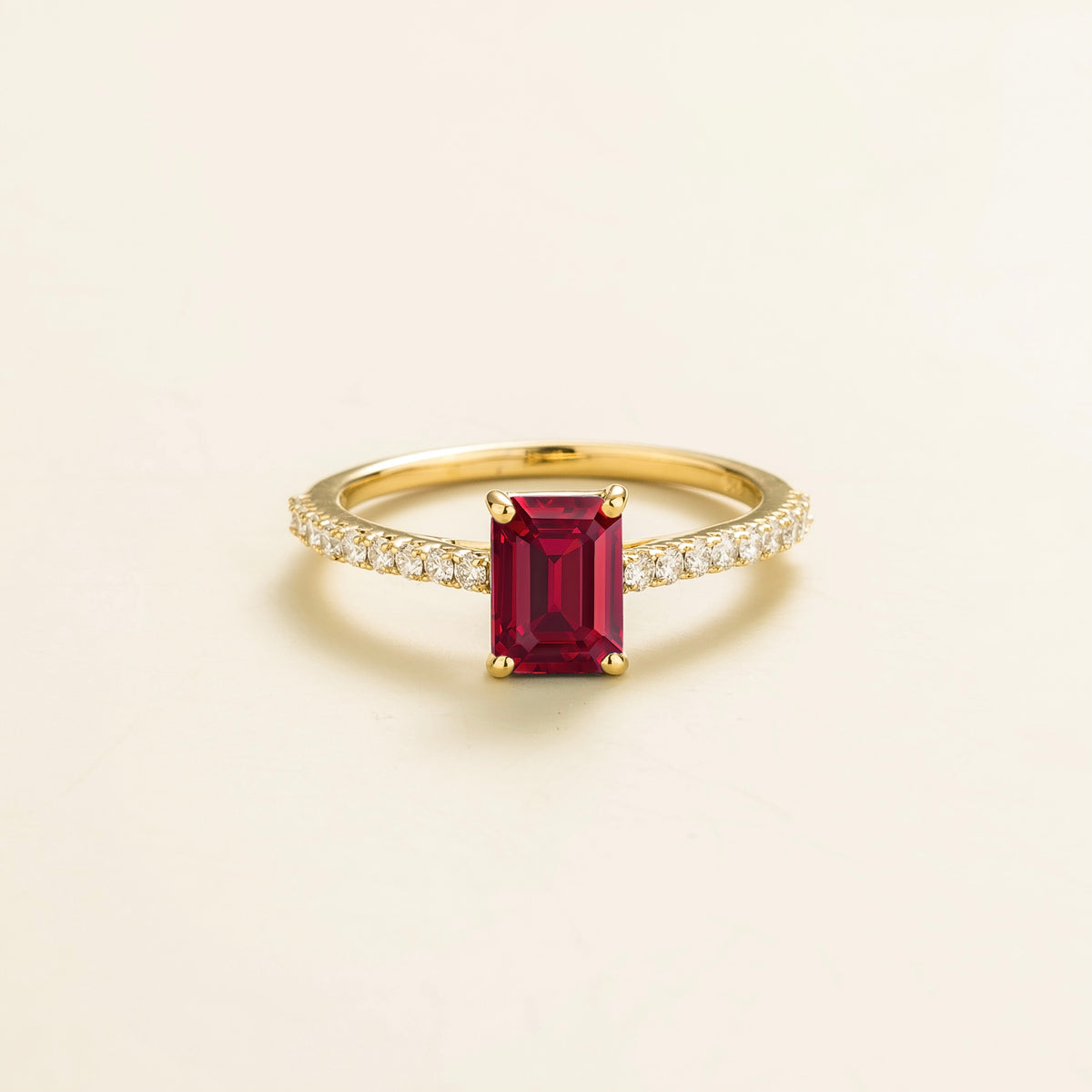 Chelle emerald-cut lab-grown ruby and diamond pavé solitaire ring in gold | Juvetti London