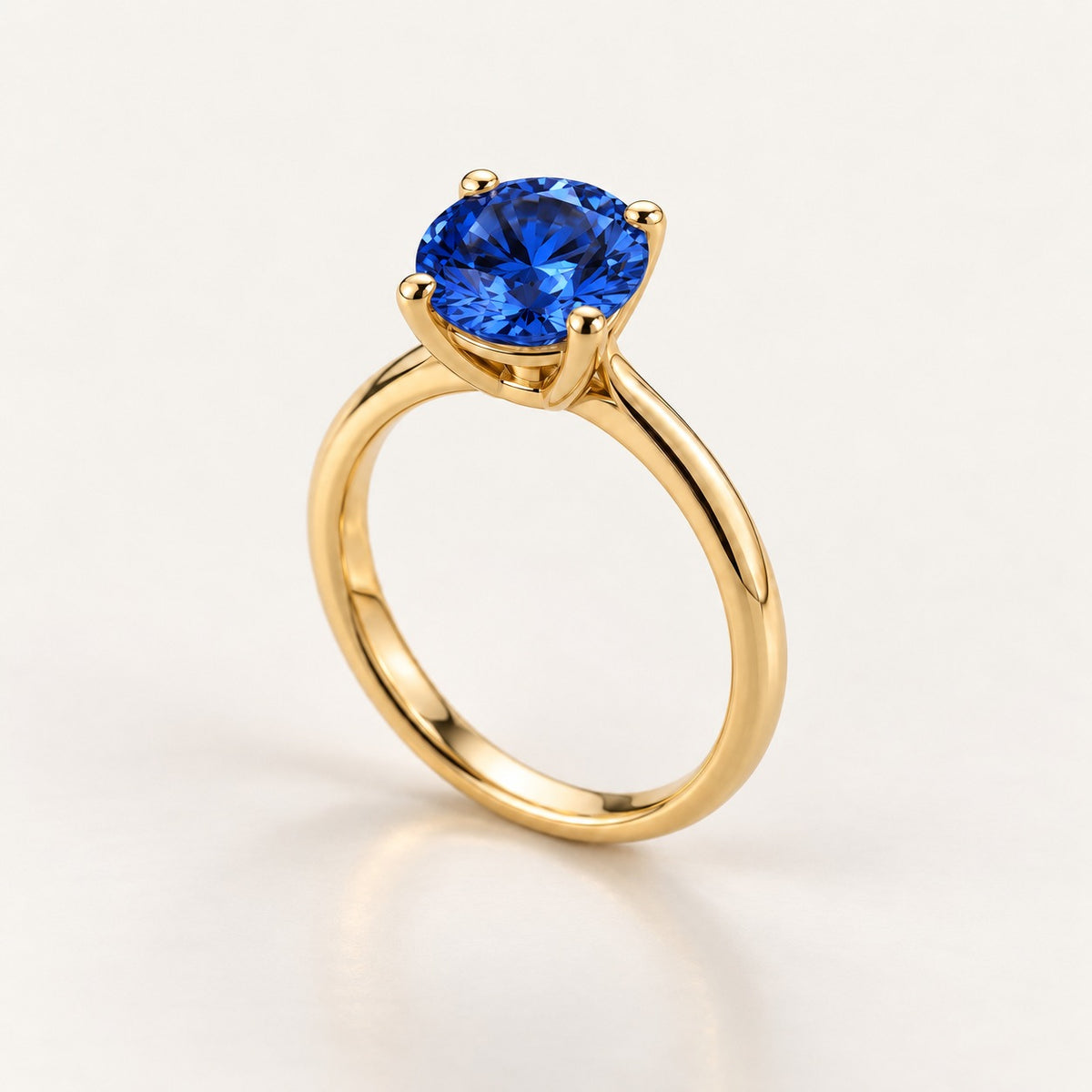 Solitaire ring setting shown with a blue sapphire