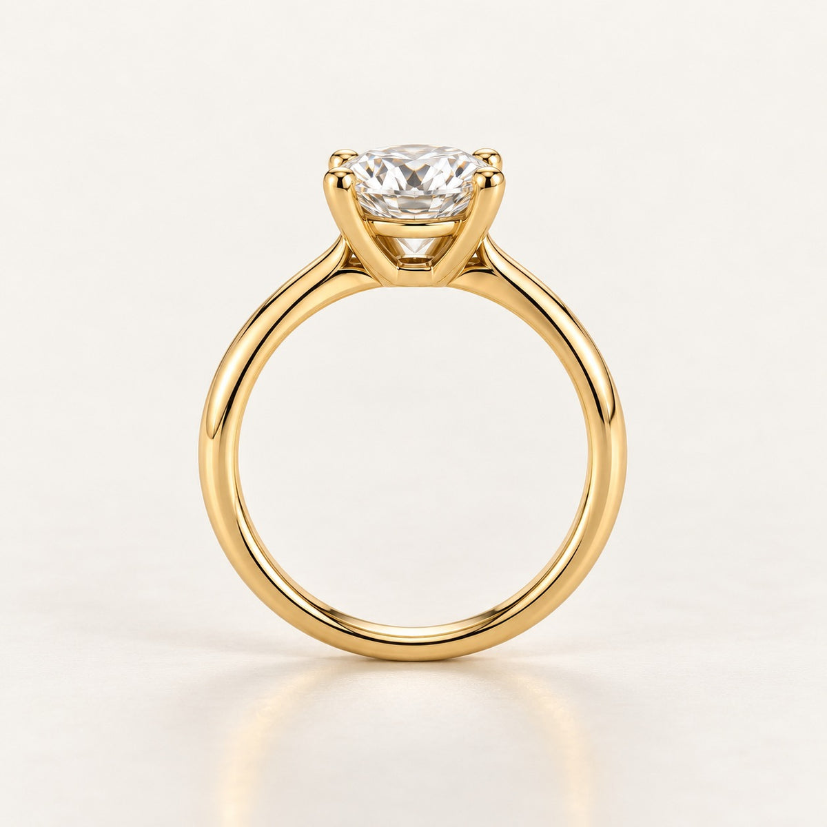 Side view of the solitaire ring setting: low basket head and slim band