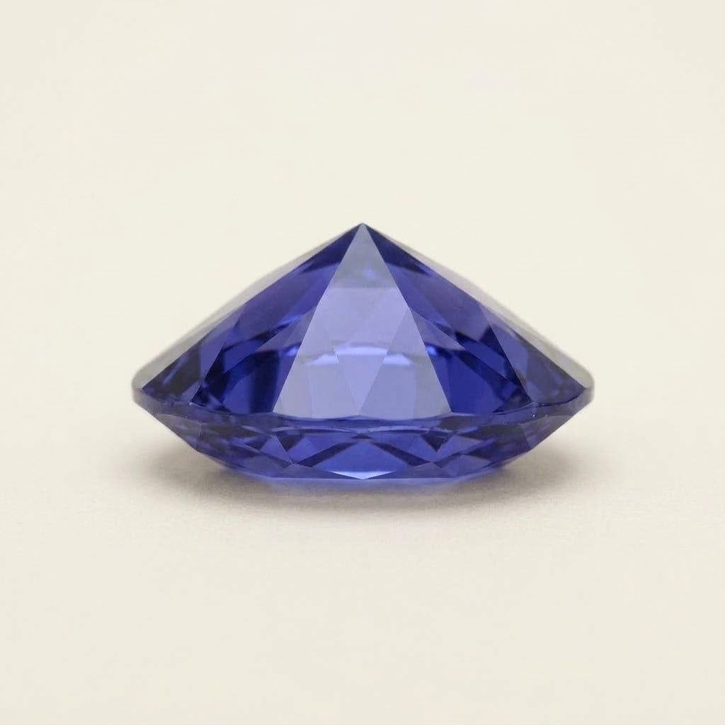 Violet-blue lab-grown sapphire, oval cut, side view