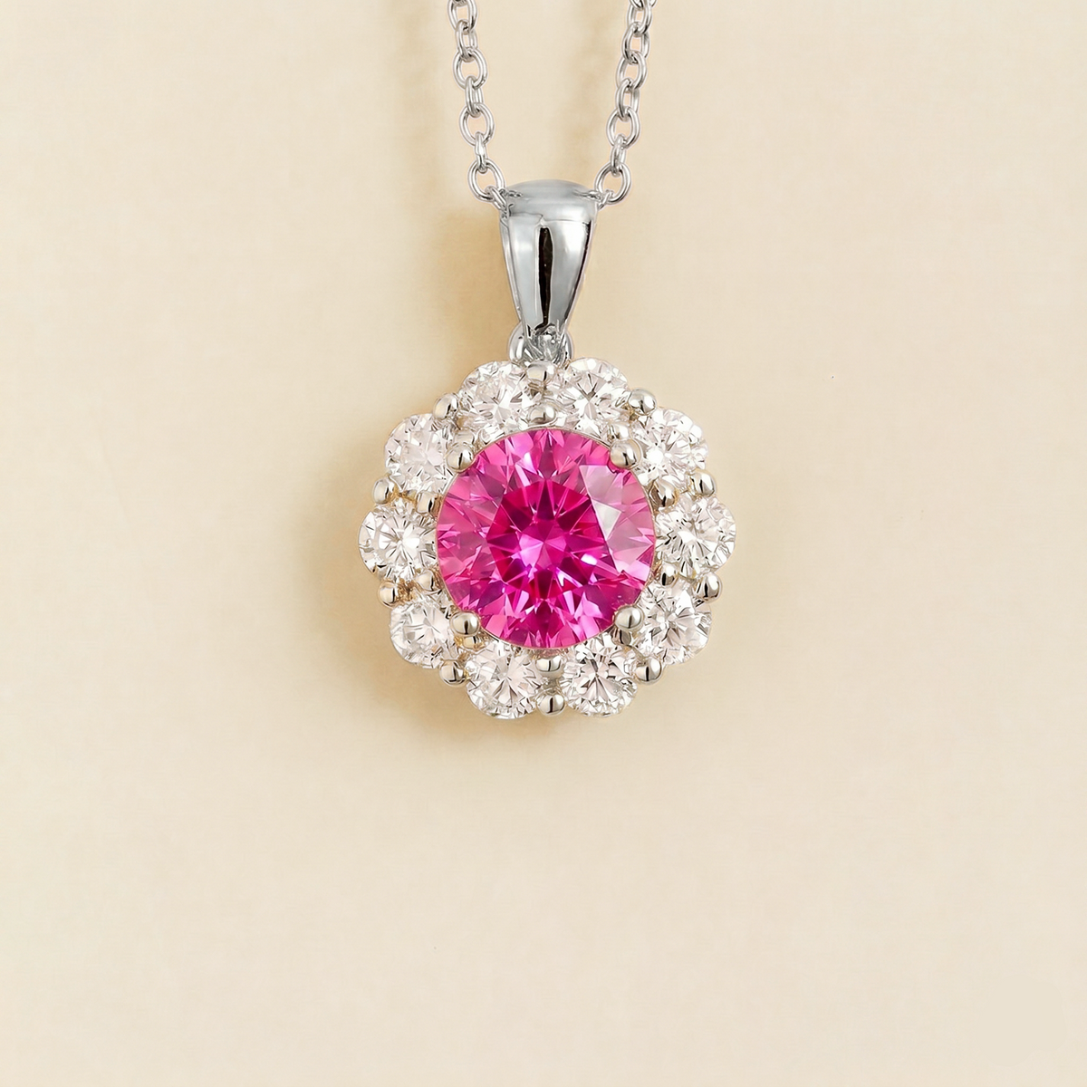 Floret round lab-grown vivid hot pink sapphire and diamond halo pendant necklace in white gold – front | Juvetti London