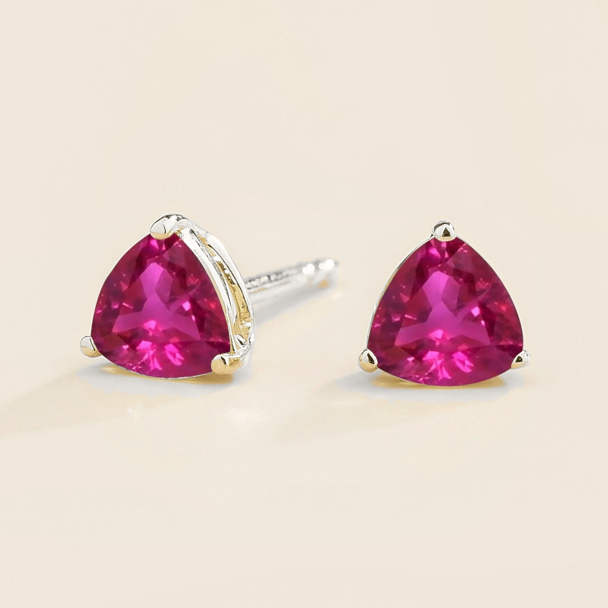 Trillion Vivid Pink Sapphire Solitaire Stud Earrings in White Gold – angle view