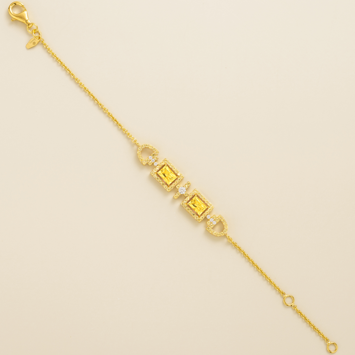 Ciceris yellow sapphire Art Deco halo bracelet in gold, two emerald-cut lab-grown sapphires with diamonds, full length | Juvetti London