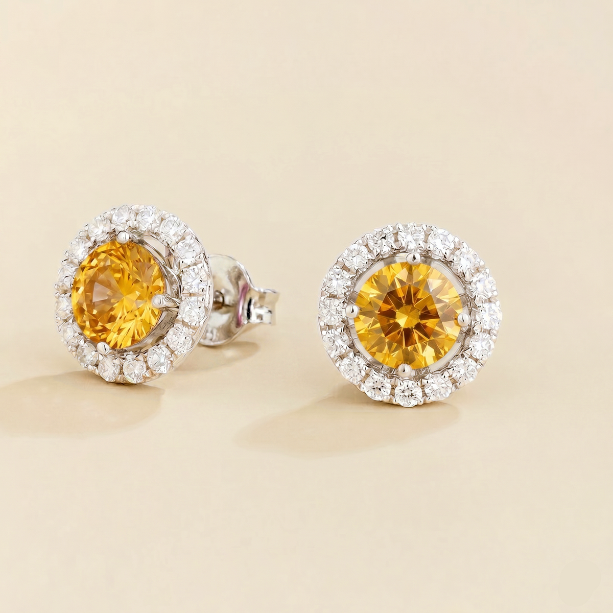 Floret round lab-grown yellow sapphire and diamond halo stud earrings in white gold – side | Juvetti London