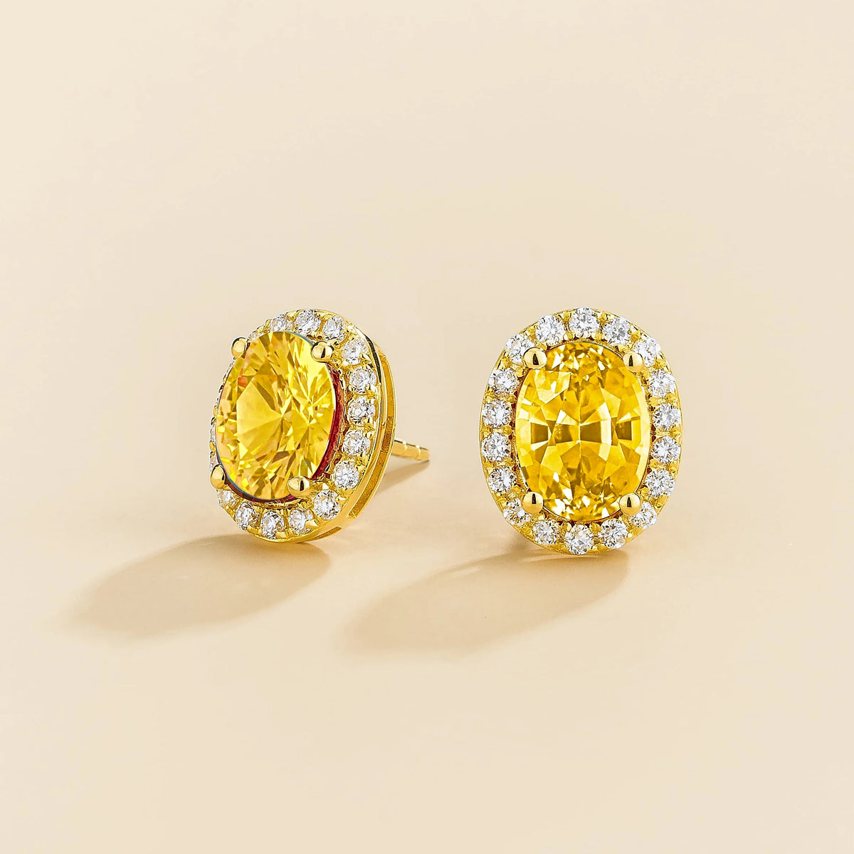 Lab-grown yellow sapphire and diamond oval halo stud earrings in gold – side view | Mina by Juvetti