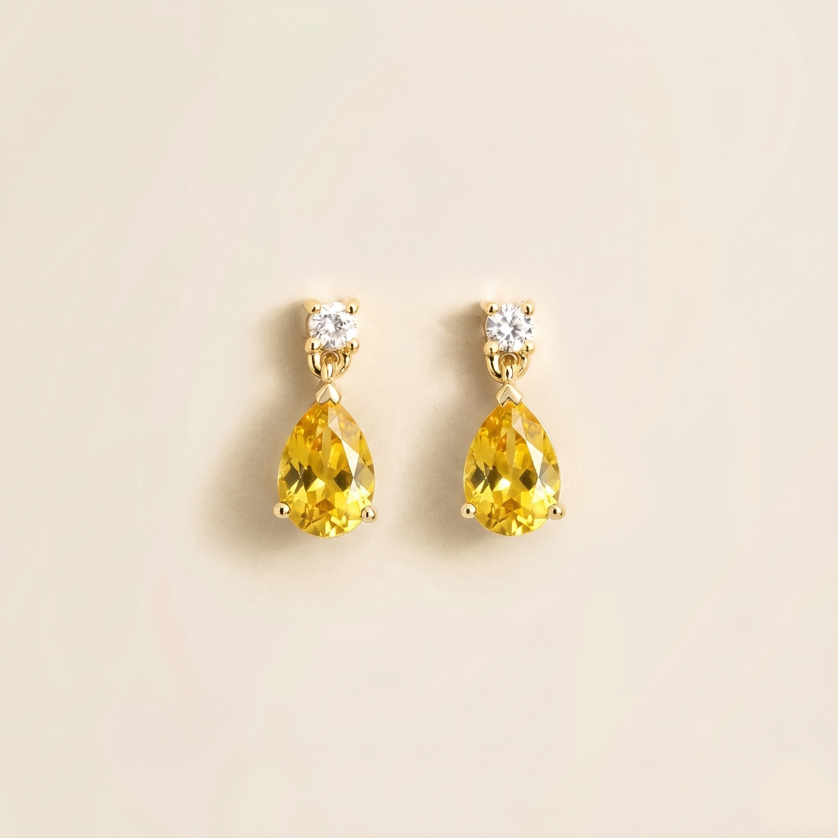 Lab-grown yellow sapphire and diamond pear drop earrings in gold – front view | Pisa by Juvetti