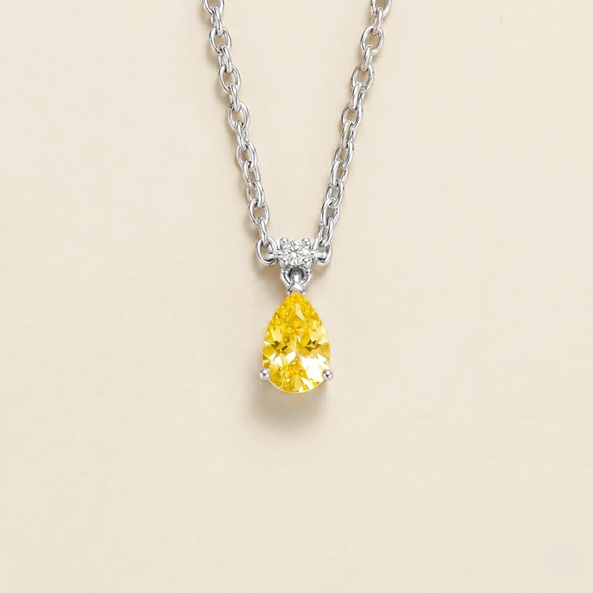Lab-grown yellow sapphire and diamond pear drop pendant necklace in white gold, small – front view | Pisa by Juvetti