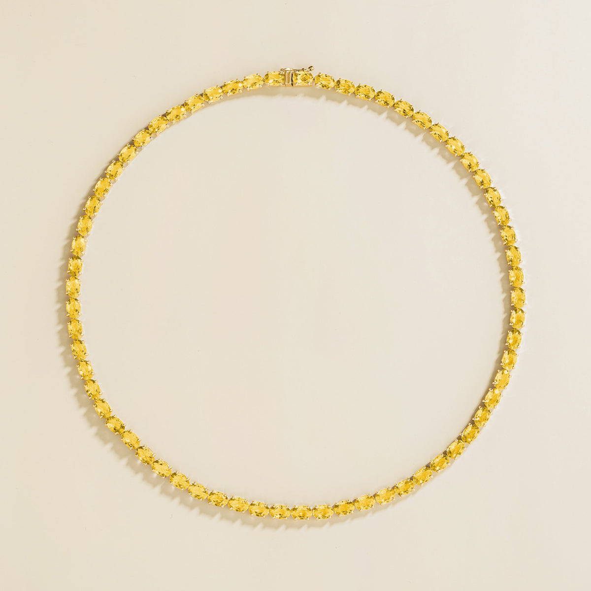Oval lab-grown yellow sapphire tennis necklace, Salto design in gold | Juvetti London