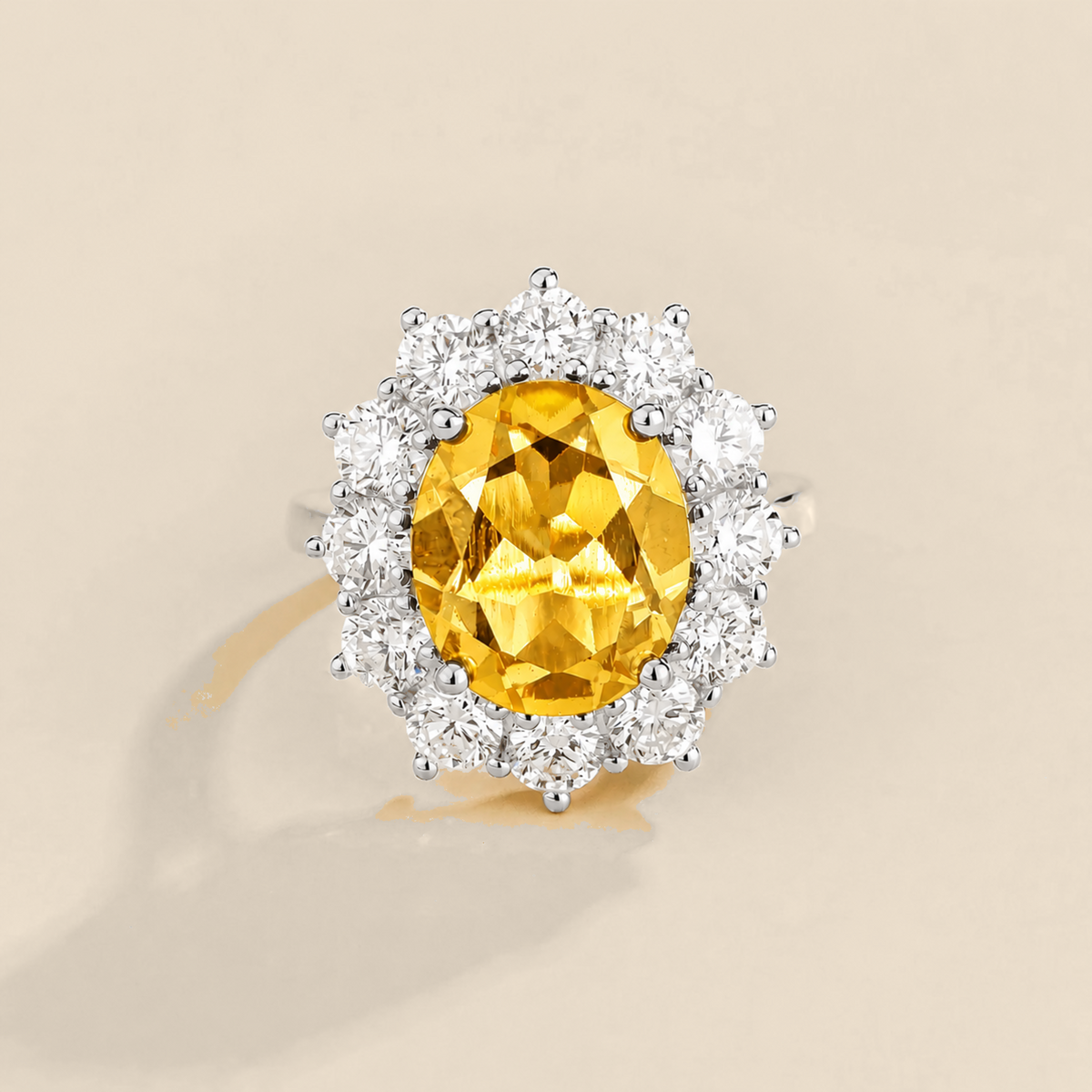Divo large oval lab-grown yellow sapphire and diamond halo ring in white gold – front view | Juvetti