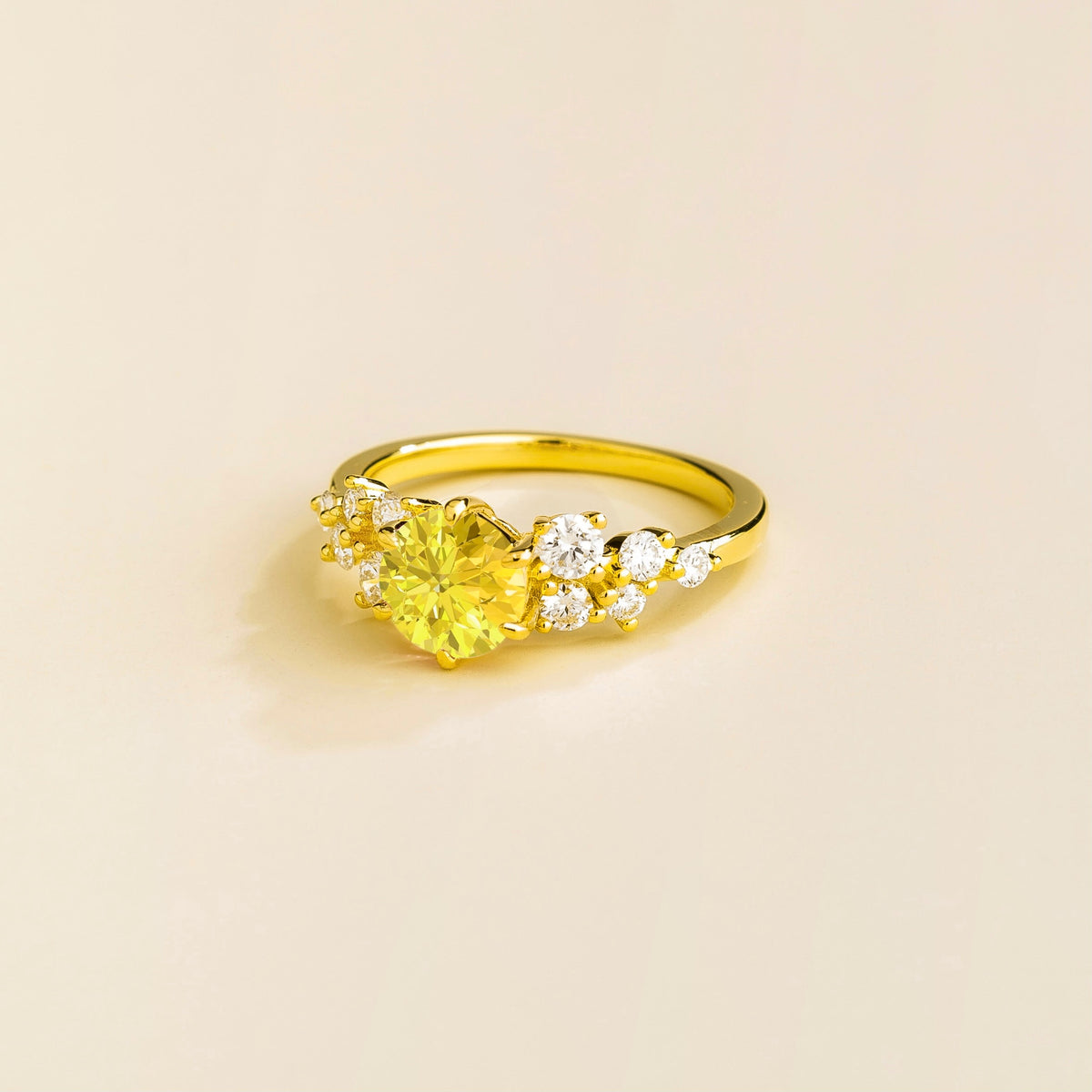 Floret round lab-grown yellow sapphire and diamond cluster ring in gold – side | Juvetti London