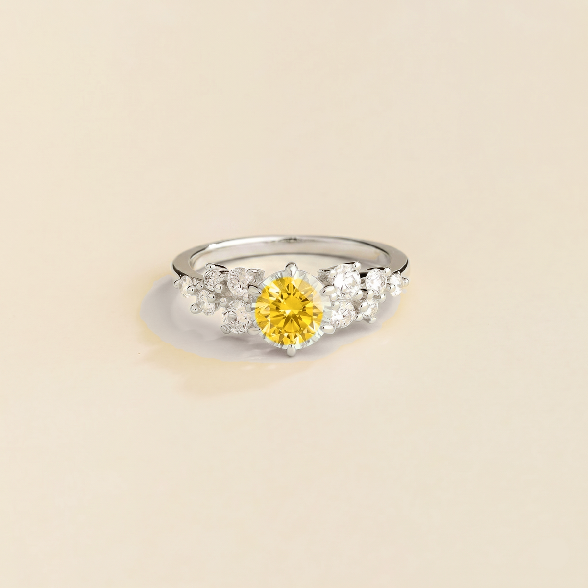 Floret round lab-grown yellow sapphire and diamond cluster ring in white gold – front | Juvetti London