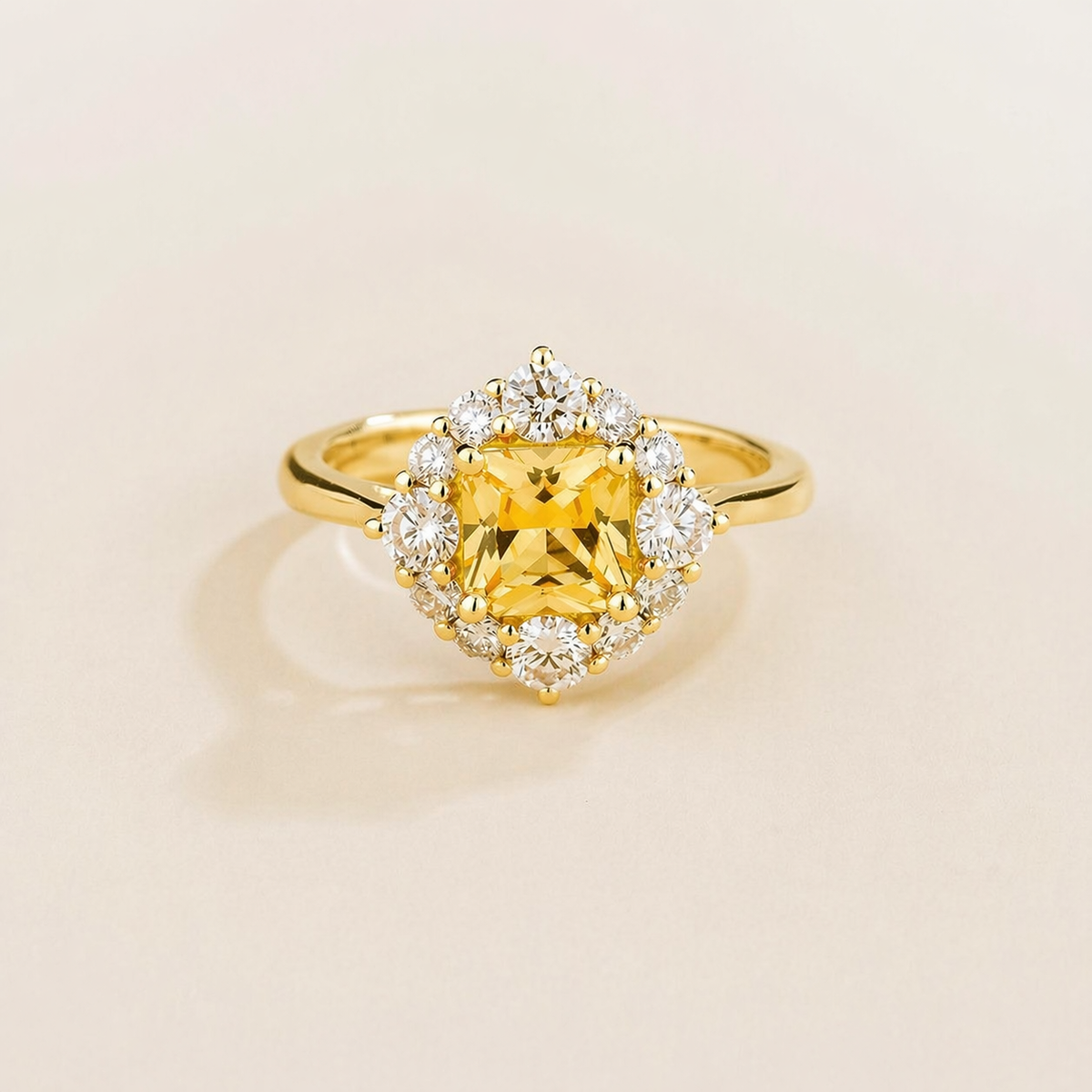 Tuli cushion-cut lab-grown yellow sapphire and diamond halo ring in gold – front view | Juvetti London