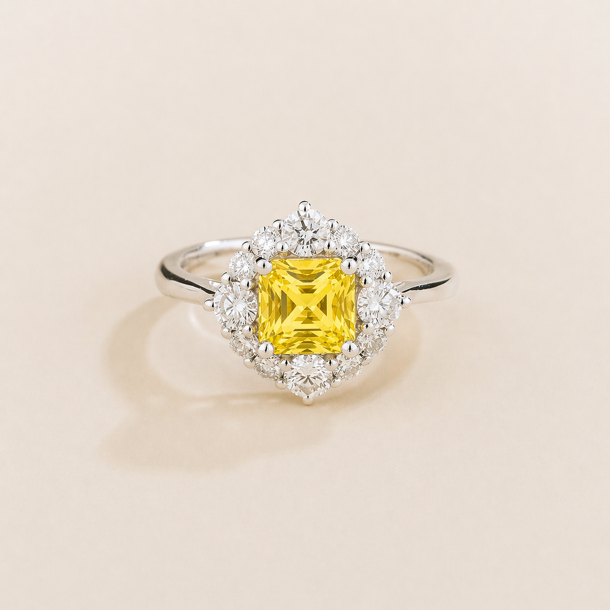Tuli cushion-cut lab-grown yellow sapphire and diamond halo ring in white gold – front view | Juvetti London