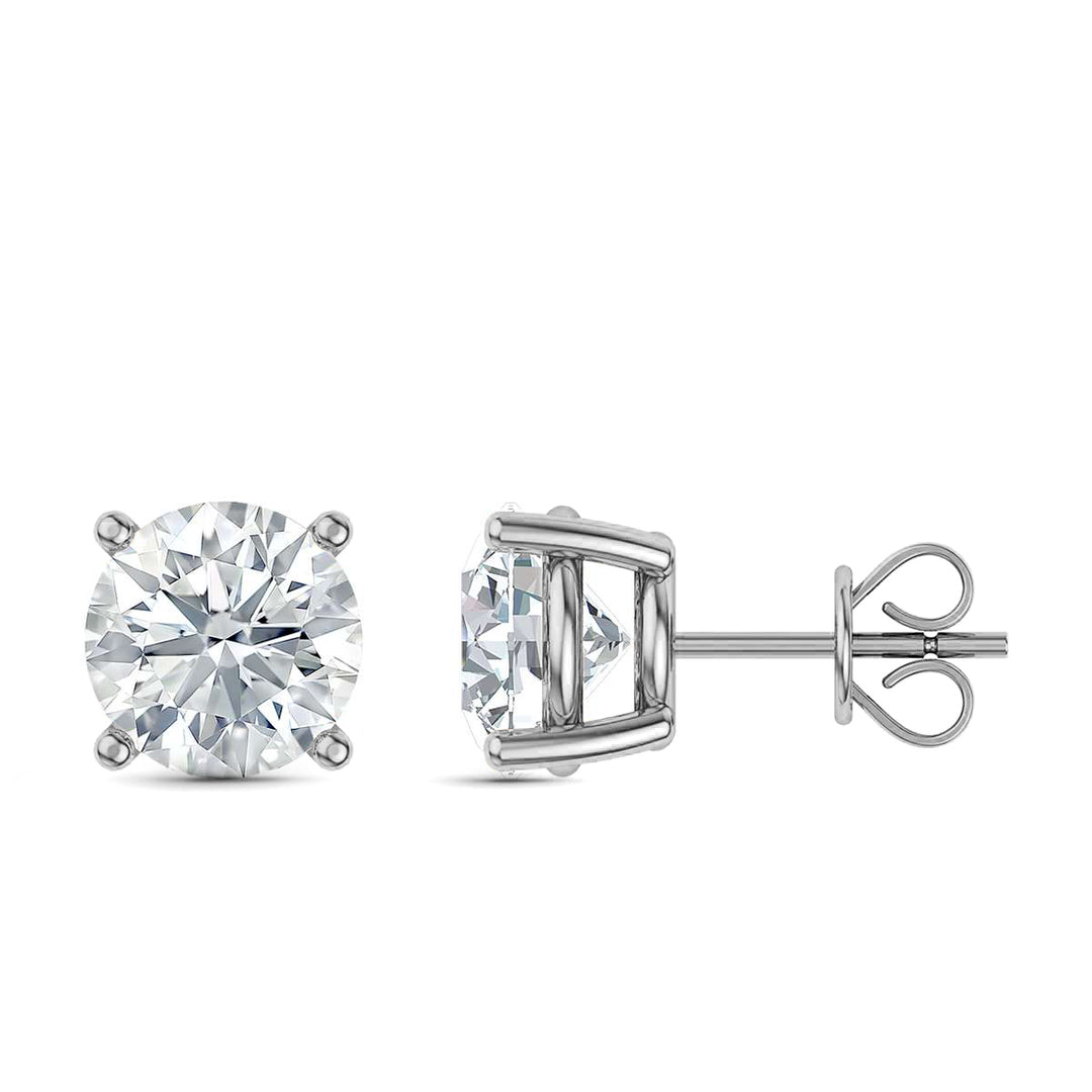 Solitaire diamond stud earrings set in White gold