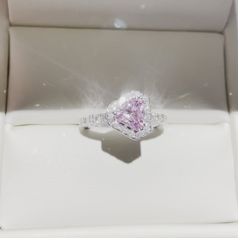 Diana ring in Pink sapphire and Diamond set in White gold