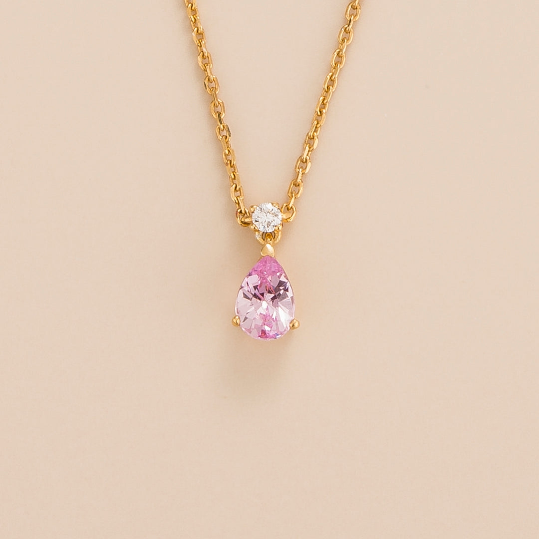 Ori necklace in 18K gold vermeil set with lab grown pear drop pink sapphire and round diamond gem stones.
