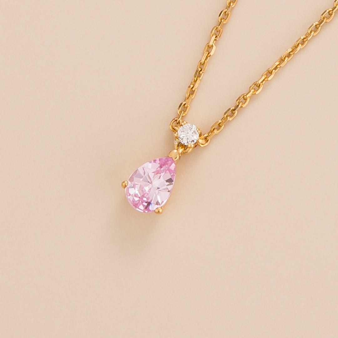 Ori necklace in 18K gold vermeil set with lab grown pear drop pink sapphire and round diamond gem stones.