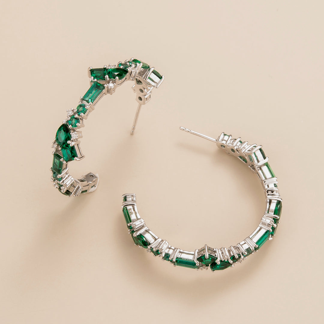 Lanna large hoop earrings in 18K white gold vermeil set with lab grown emerald and diamond gem stones. Perfect for yourself and as gift.