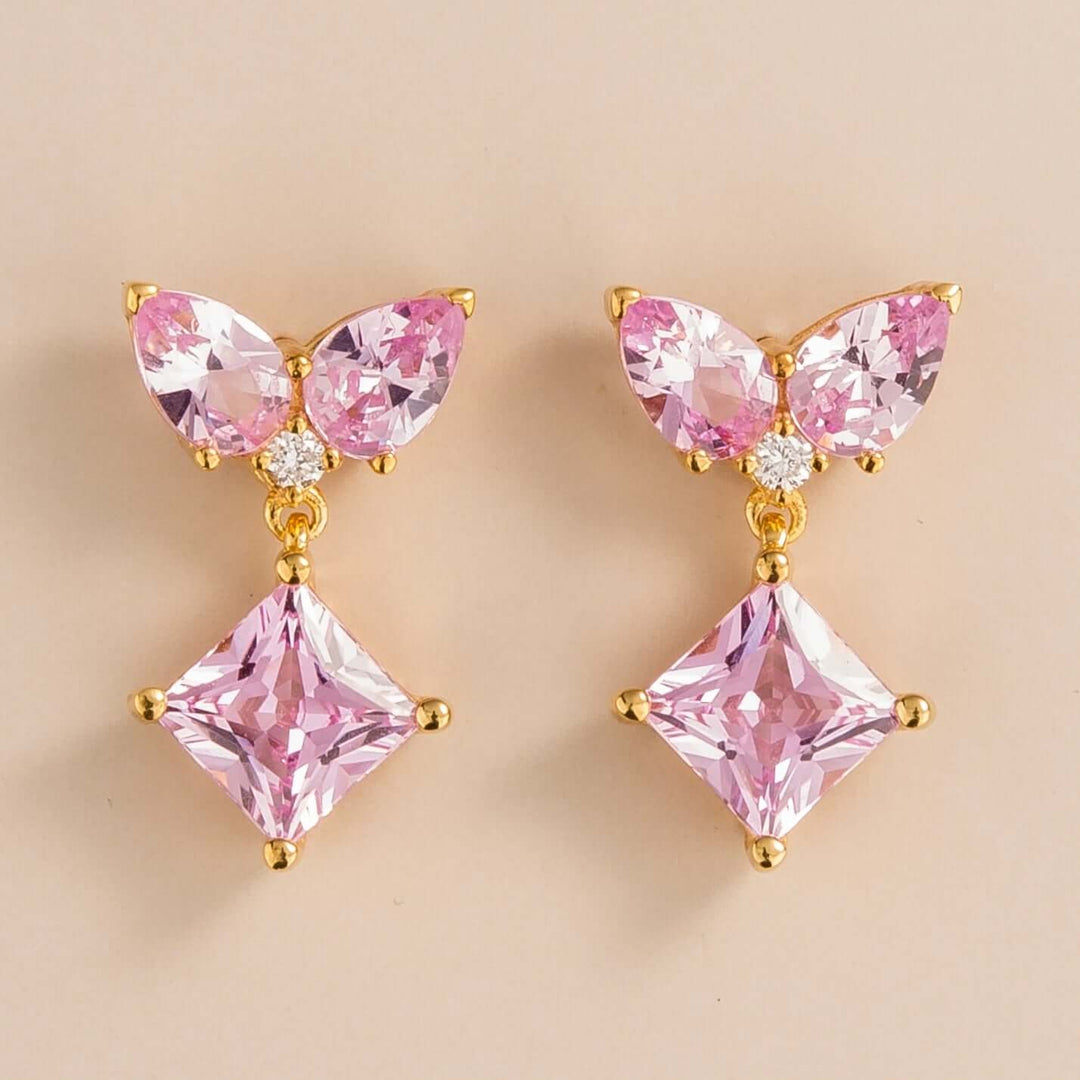 Amore earrings in 18k gold vermeil set with lab grown diamond and pink sapphire.