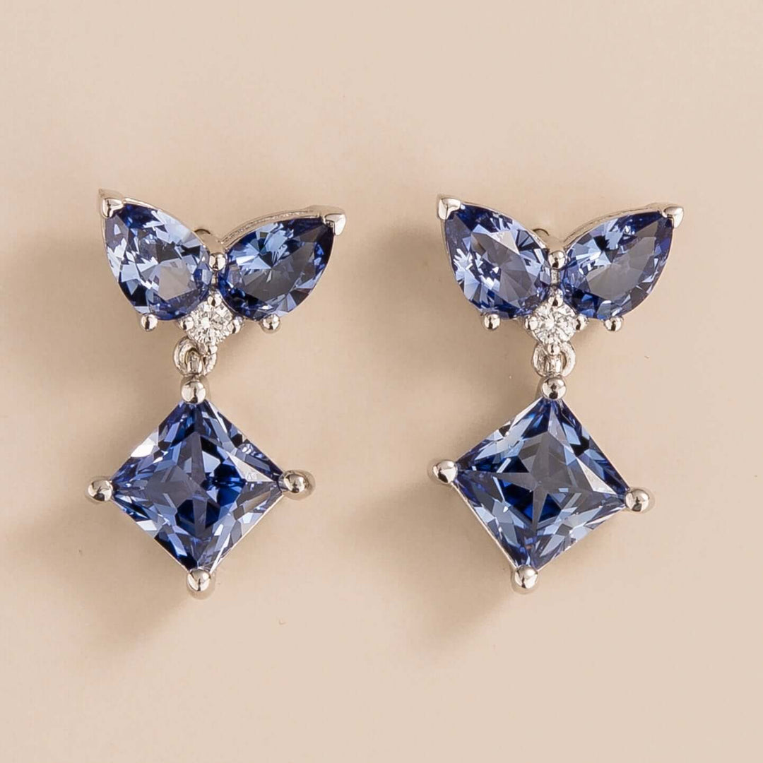 Amore earrings in 18K white gold vermeil set with lab grown diamond and ceylon blue sapphire. Perfect for yourself and as gift.